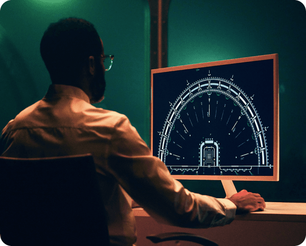 Man works comfortably in his home office heated by an S8V2-C furnace