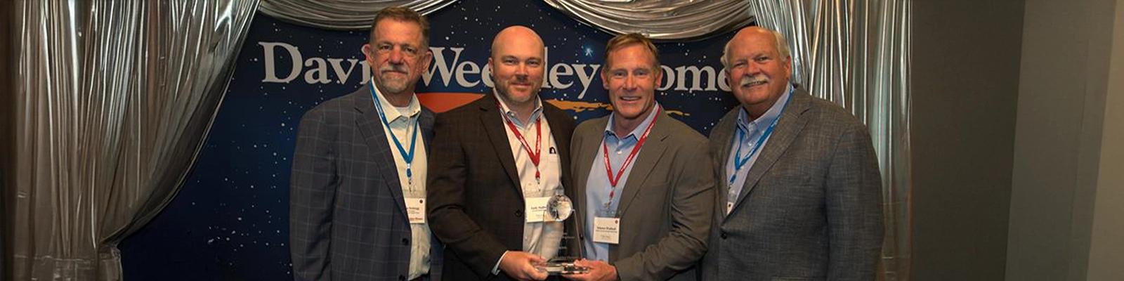 Trane received David Weekley Homes’ 2025 National Preferred Partner Award. Pictured (left to right) John Schiegg, Vice President of Purchasing & Supply Chain, David Weekley Homes, Andy Stallworth, Trane’s manager for strategic partnerships, Trane, Schawn Walthall, Trane national account manager, and David Weekley, Chairman, David Weekley Homes.