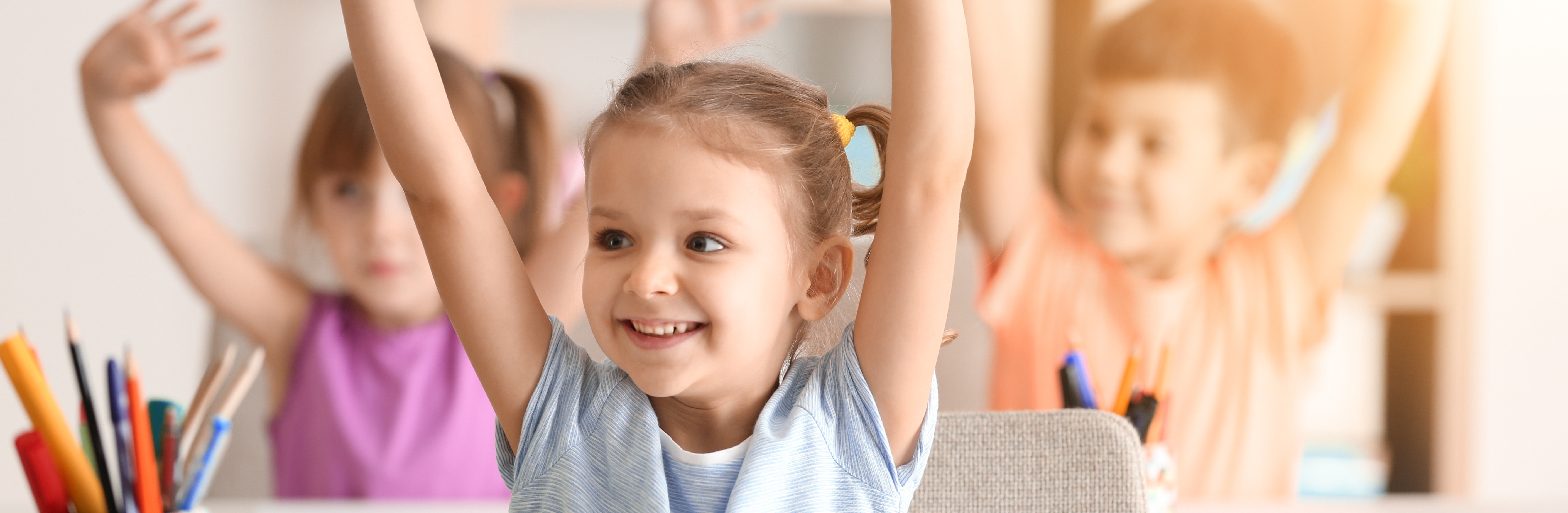 Cute girl at lesson in classroom